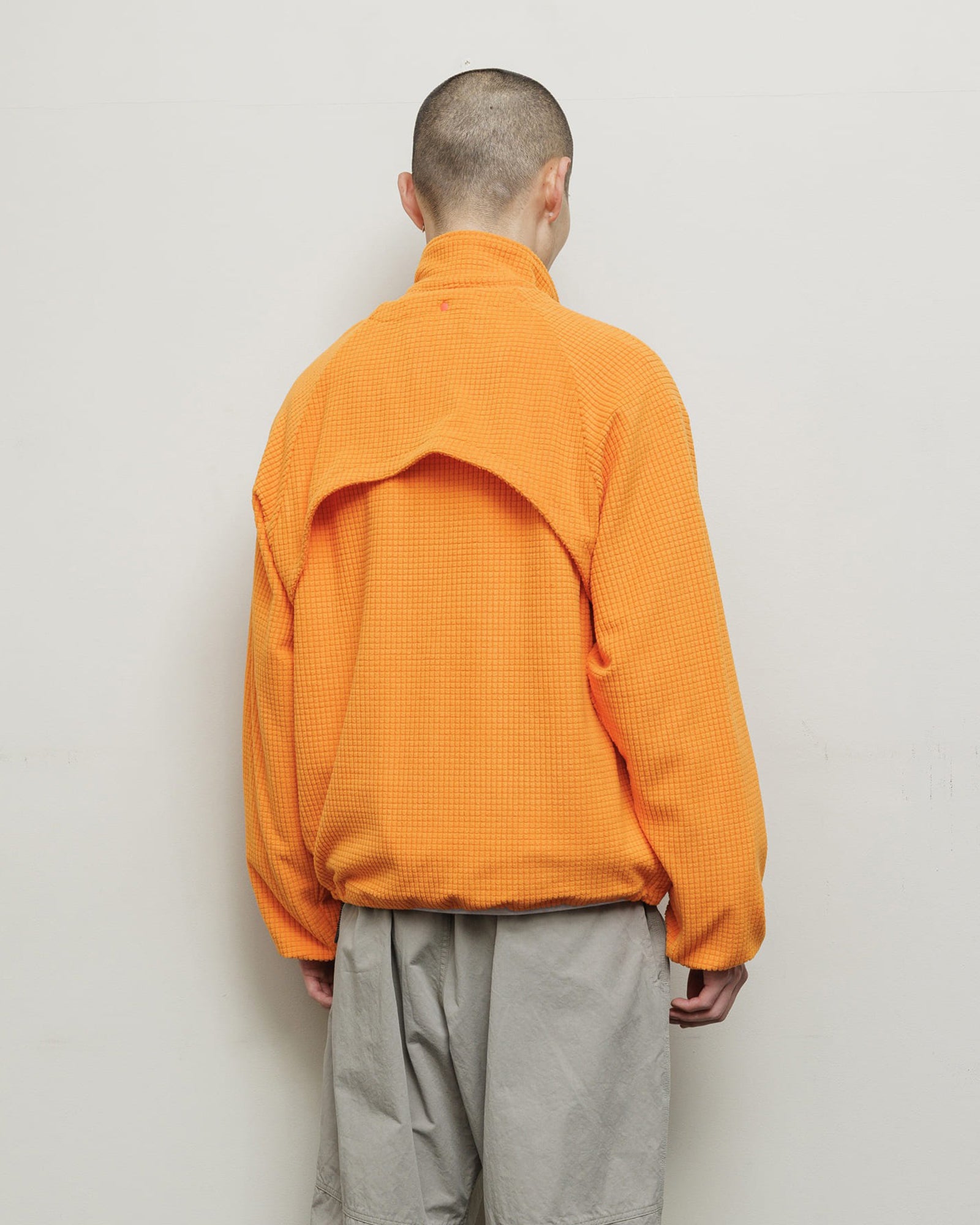 DETACHABLE SLEEVE GRID FLEECE PULL OVER (Orange)