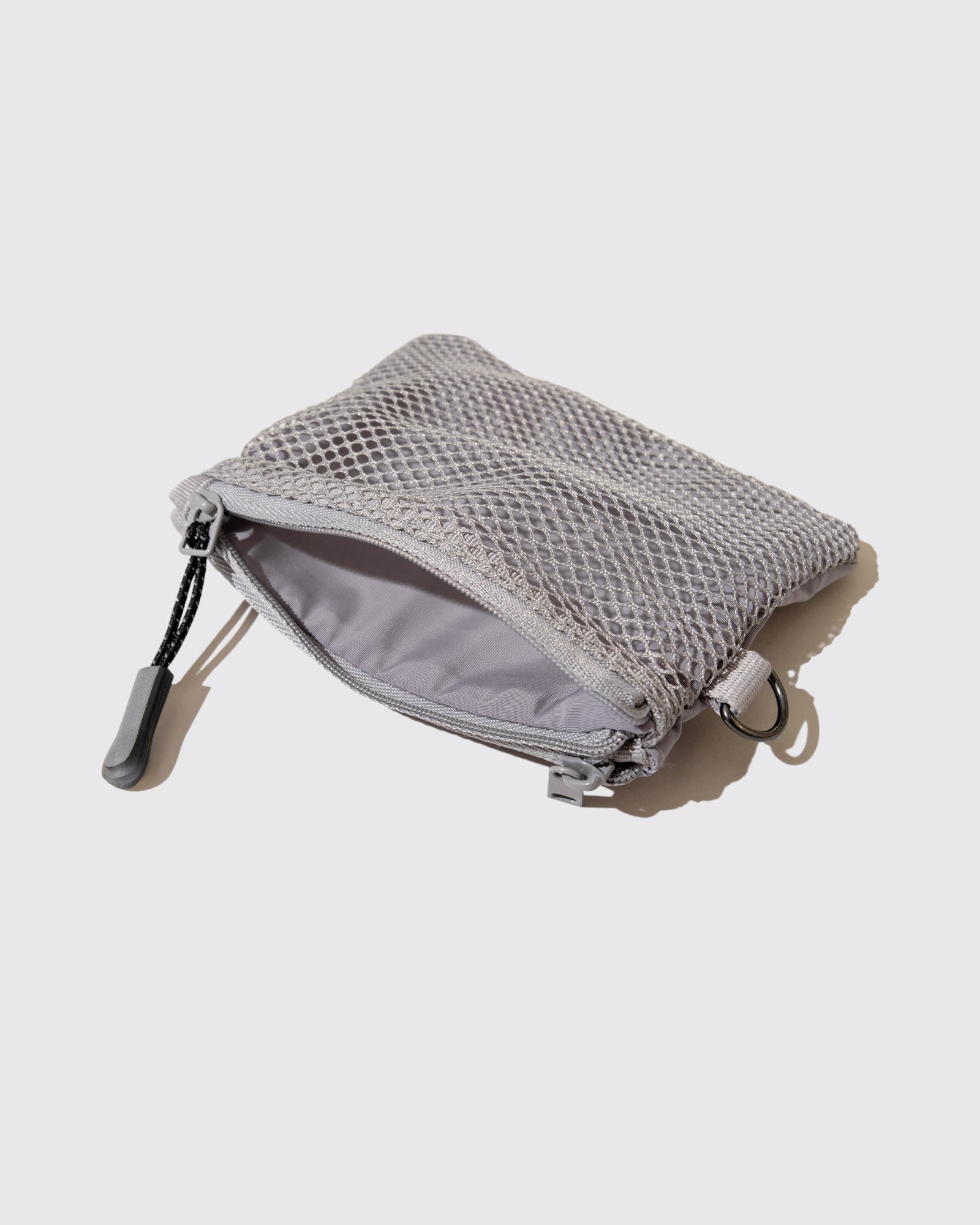 FYPM GLOW REFLECTIVE POUCH